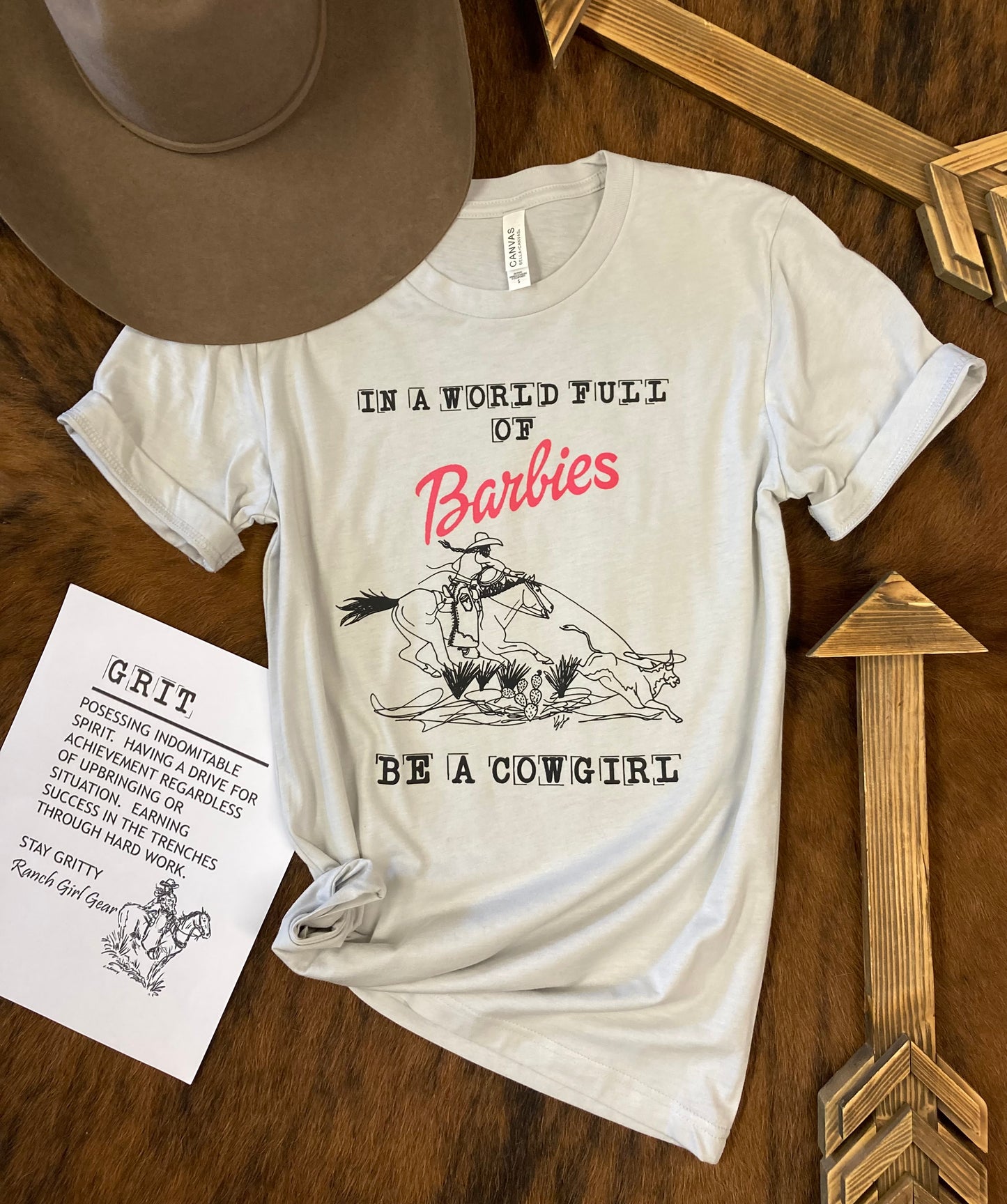 In A World Full of Barbies Be A Cowgirl Tee